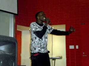 Efinals- Kenny Adjetey3 (Angelo Elia) Kenny Adjetey, 17, peformed positive rap to the crowded student centre, winning second place at the show. Photo by Angelo Elia
