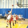 PHOTO BY JESSE THOMAS // Humber forward Kaitlynn Paulley takes a shot inisde against Fanshawe; she finished with 12 points.