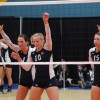 Humber players Kris Dowling (#1), Kelly Nyhof (#10) and Rebecca Sobie (#15) await a serve by Nina Carino (#5)