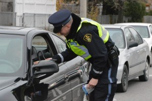 Const. Greg Turpin hands out R.I.D.E. Check booklets at the first R.I.D.E. Check of the festive season, hosted at Humber’s North campus.
