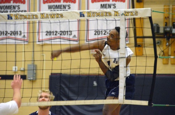PHOTO BY GEORGE HALIM Andre Smith spikes one of his team’s 34 kills in the Dec. 1 home win over College Boreal.