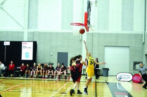 Humber's Natalie Hagopian drives to the basket for a lay-in during OCAA tournament action.
